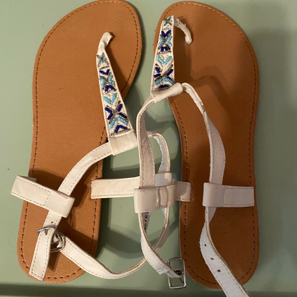 blue and white strap tan sandals